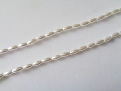 Strand of 100 3mm x 6mm White Pearl Rice Beads