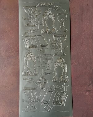 Church Service Silver. Religious themed peel off stickers featuring nineteen images including chalices, praying hands, crosses and bibles in a silver colour.