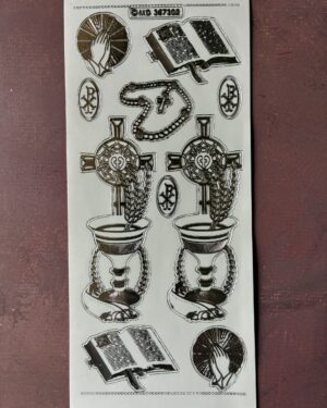 Religious Occasions Transparent Silver. Features nine images including a large cross with chalice, rosary beads, praying hands and bibles in a silver colour.